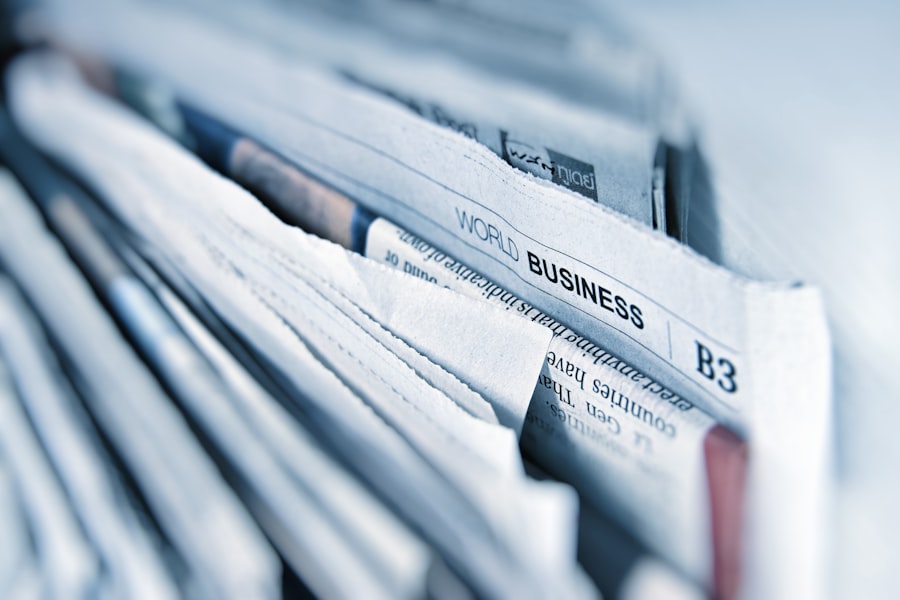 Reading headlines on a laptop